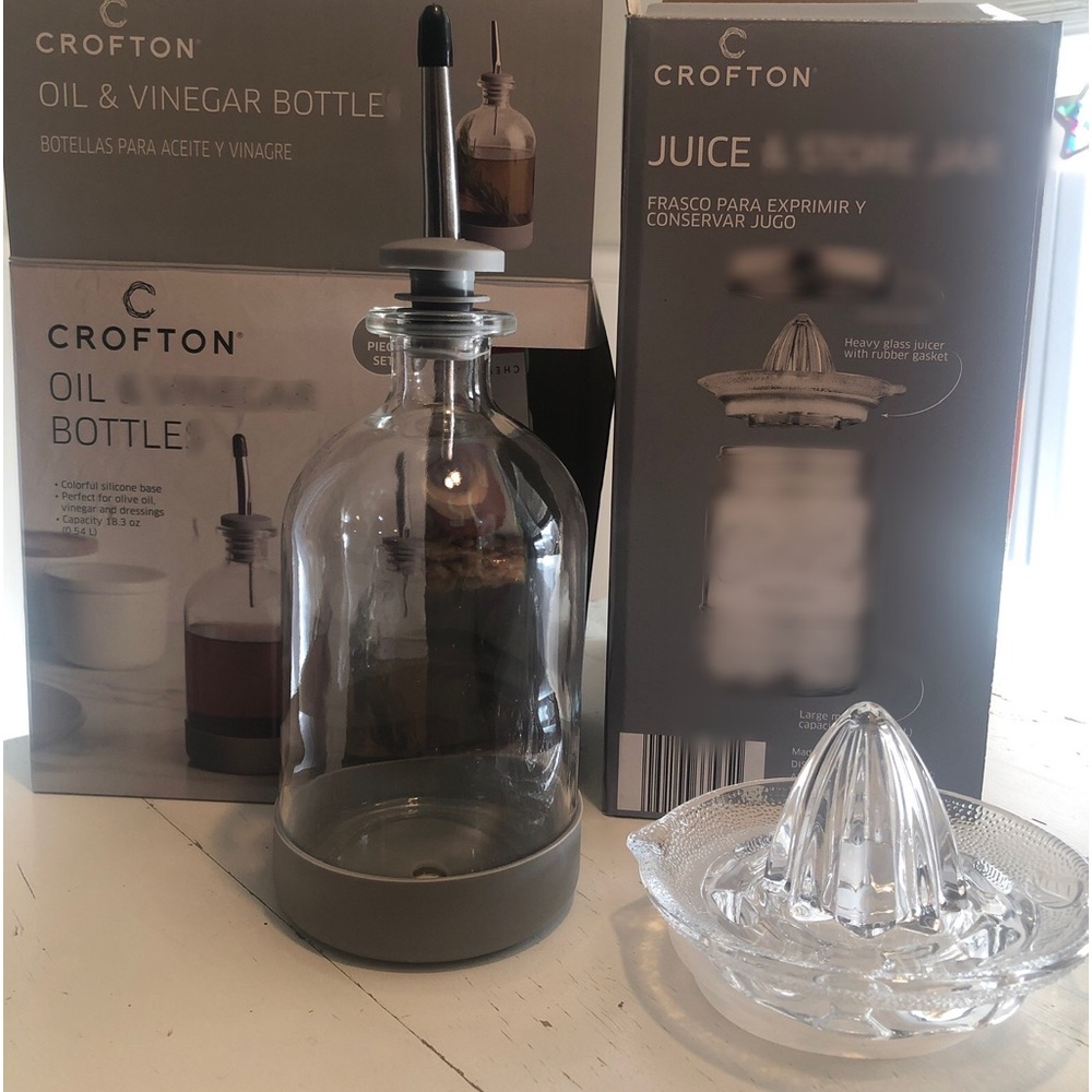 1 oil & vinegar silicone base glass bottle & 1 glass juicer w rubber gasket. New